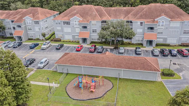 an aerial view of a house with a garden