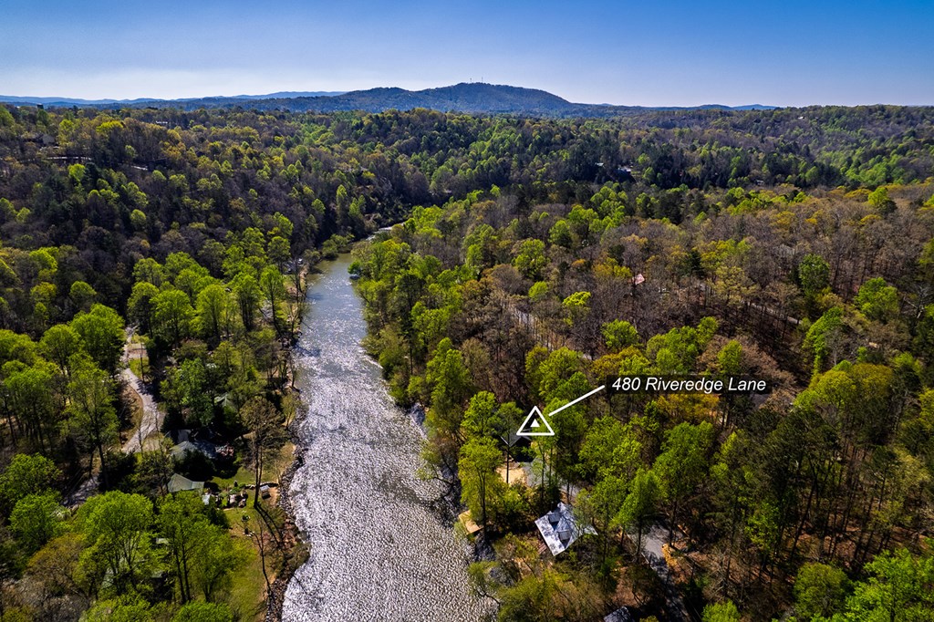 480 Riveredge Lane Ellijay, GA 30540 - Photo 13 of 66 a view of a lush green hillside and houses