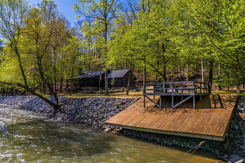 480 Riveredge Lane Ellijay, GA 30540 - Photo 14 of 66 a view of a swimming pool with a patio