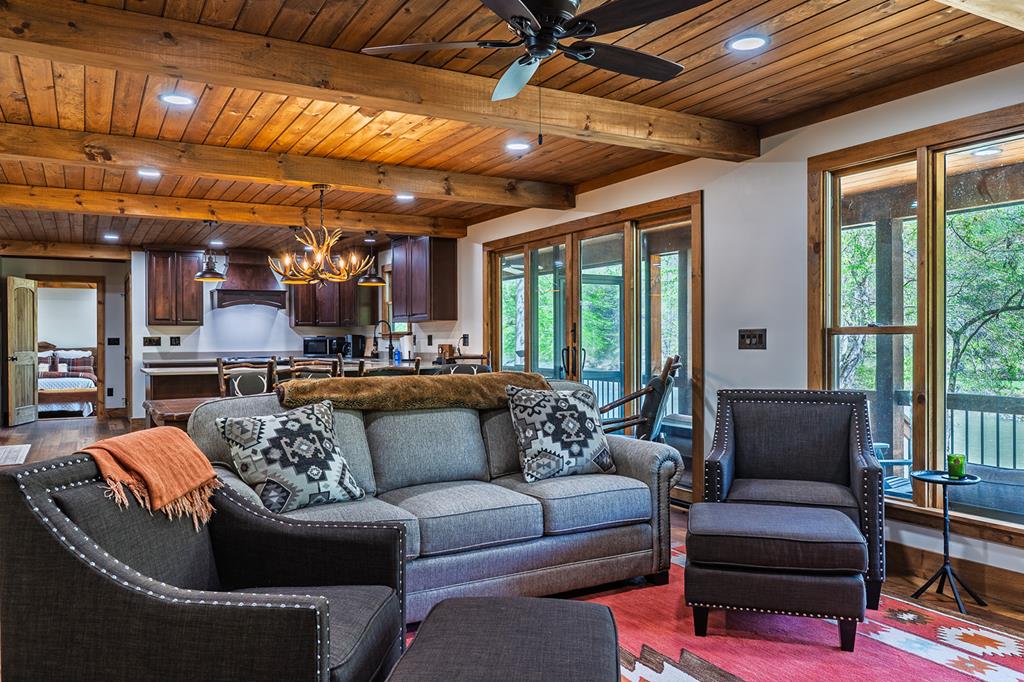 480 Riveredge Lane Ellijay, GA 30540 - Photo 30 of 66 a living room with furniture and a large window