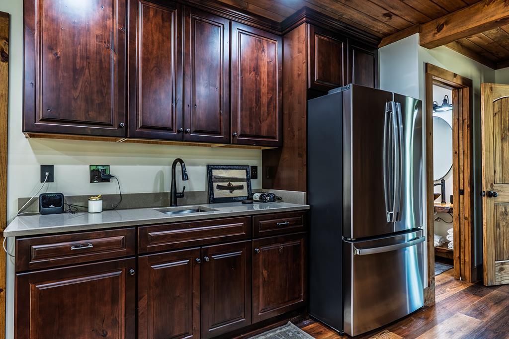 480 Riveredge Lane Ellijay, GA 30540 - Photo 42 of 66 a kitchen with stainless steel appliances granite countertop a refrigerator and a sink