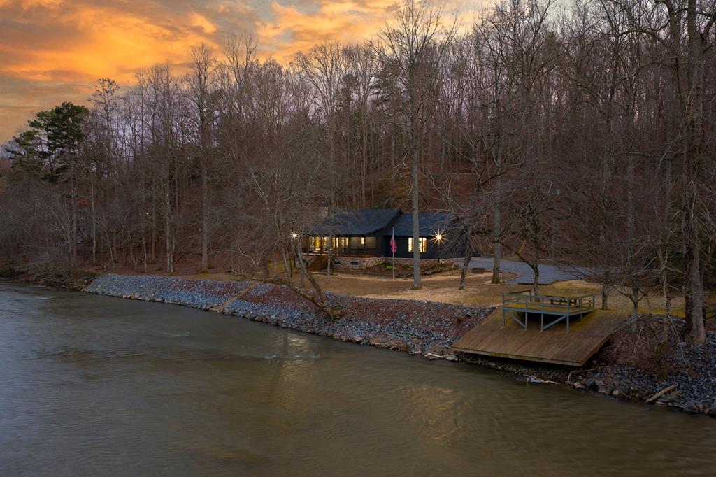 480 Riveredge Lane Ellijay, GA 30540 - Photo 47 of 66 a view of a lake with a house