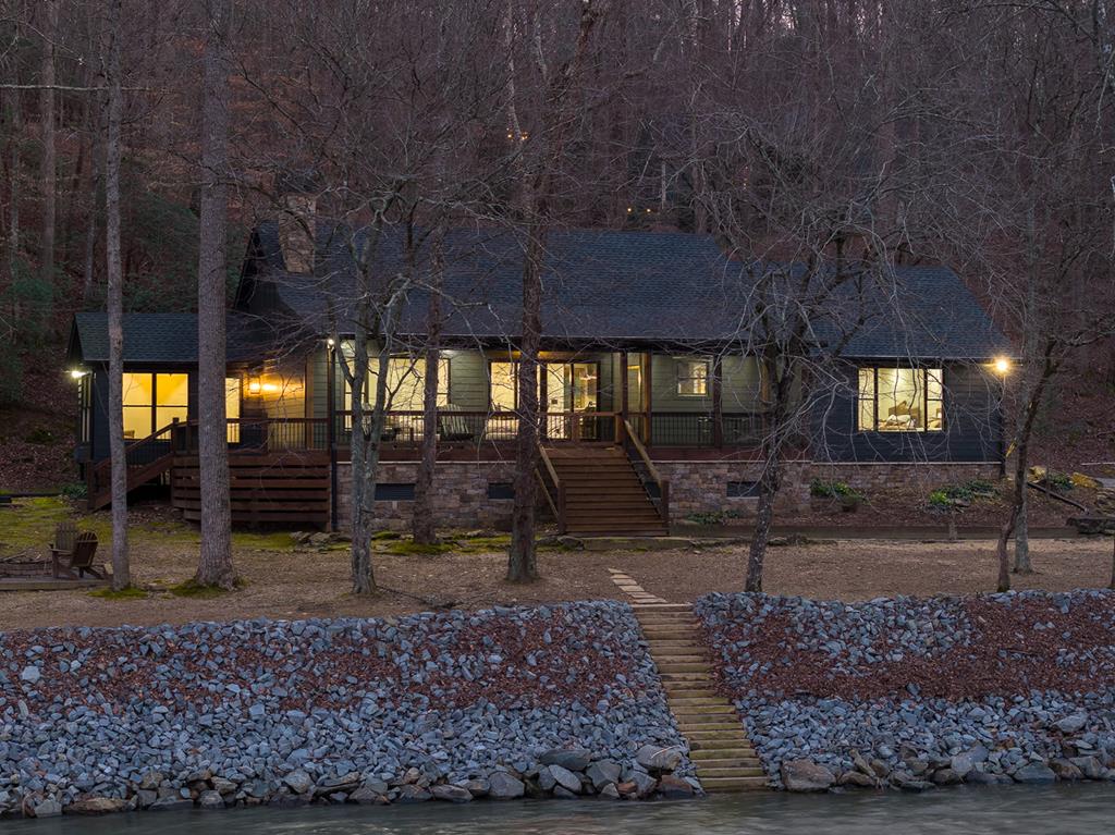 480 Riveredge Lane Ellijay, GA 30540 - Photo 52 of 66 a front view of a house with garden