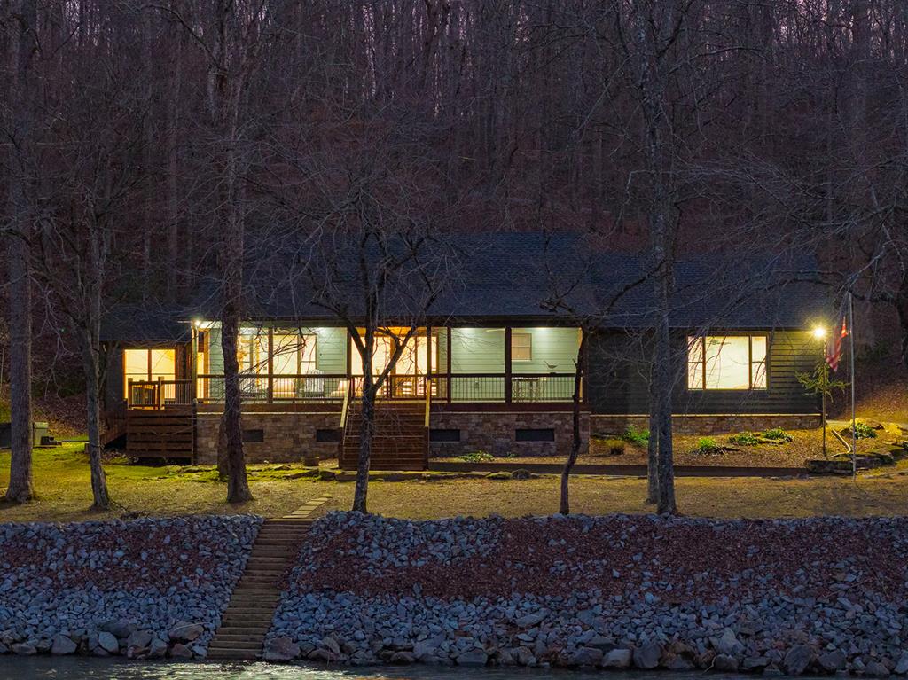 480 Riveredge Lane Ellijay, GA 30540 - Photo 64 of 66 a view of a swimming pool with a yard