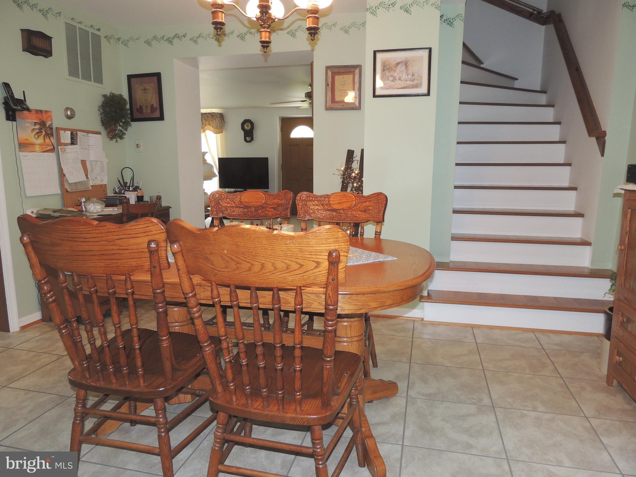 13730 Unionville Road Mount Airy, MD 21771 - Photo 6 of 30 a view of a dining room with furniture