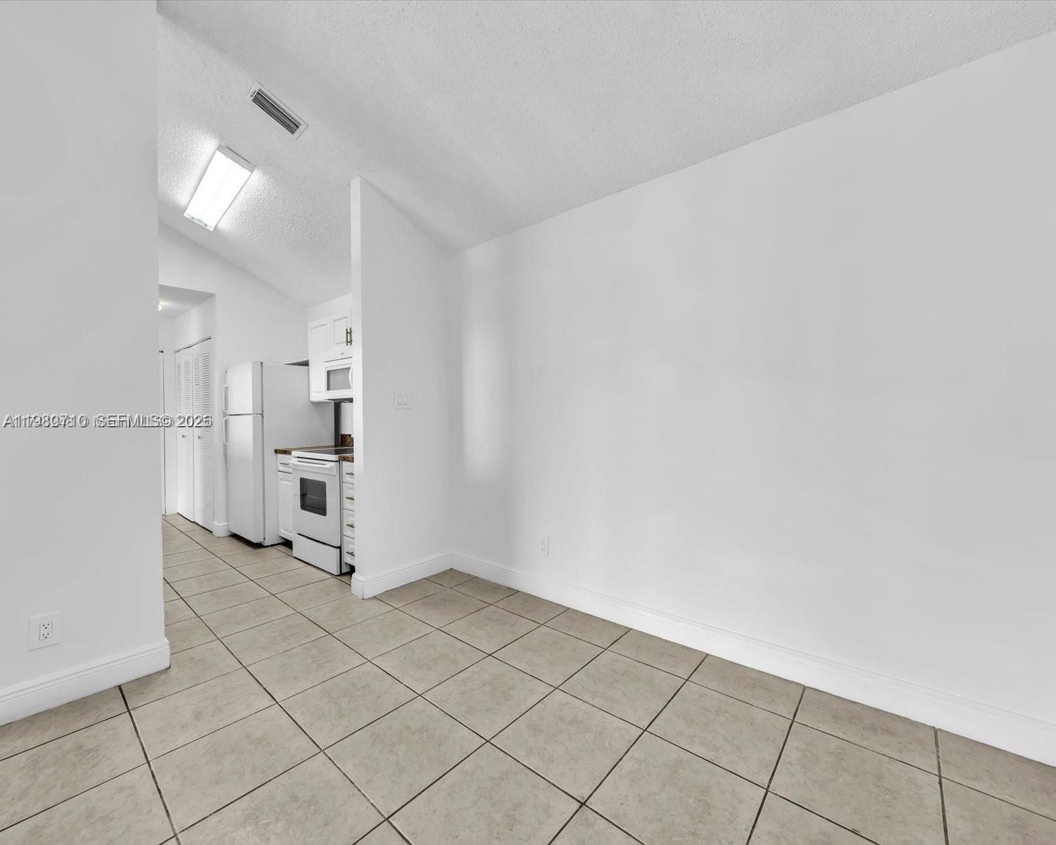 15770 Southwest 106th Terrace, Unit 303 Miami, FL 33196 - Photo 44 of 64 a view of empty room