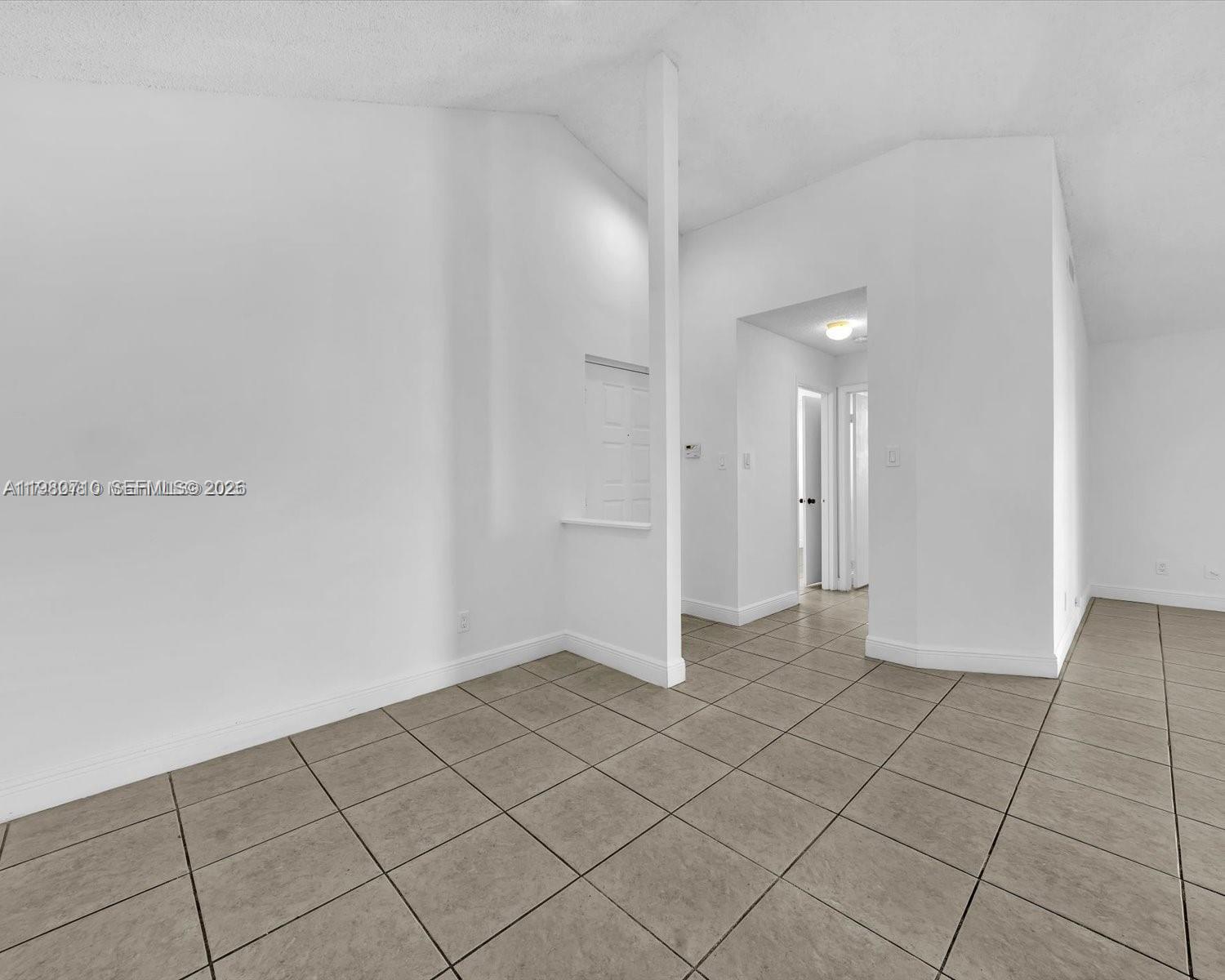 15770 Southwest 106th Terrace, Unit 303 Miami, FL 33196 - Photo 45 of 64 a view of an empty room