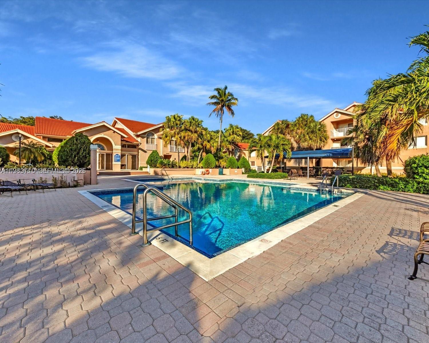 15770 Southwest 106th Terrace, Unit 303 Miami, FL 33196 - Photo 53 of 64 a view of swimming pool with a yard