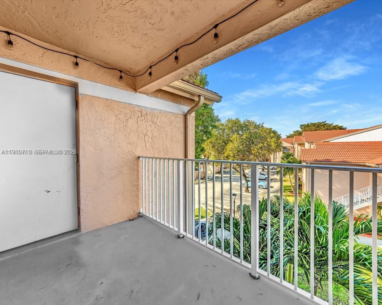 15770 Southwest 106th Terrace, Unit 303 Miami, FL 33196 - Photo 64 of 64 a view of a balcony