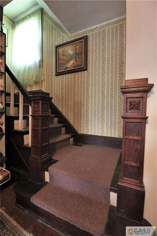 582 Ridge Road Monmouth Junction, NJ 08852 - Photo 8 of 18 a view of entryway with wooden floor