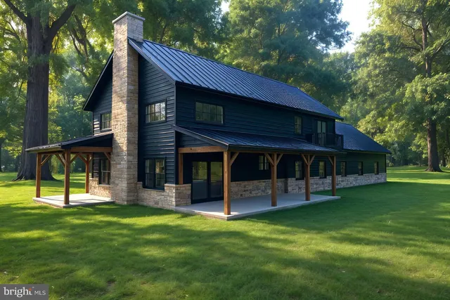 a view of a house with backyard and porch