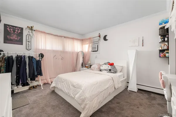 a bedroom with a bed and a walk in closet
