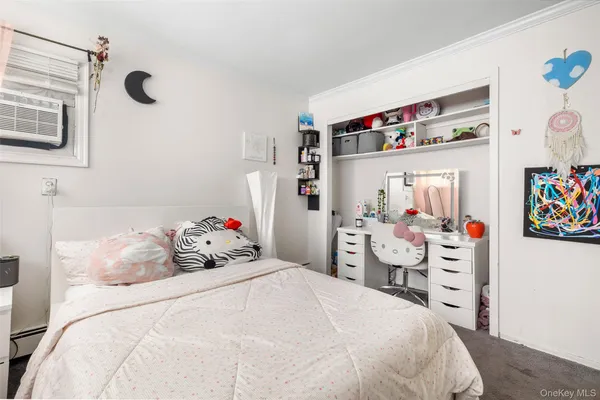 a bedroom with a bed and closet