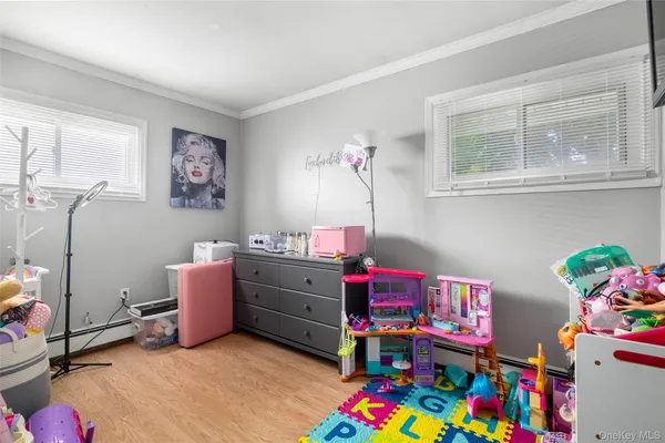 a room with toys and a wooden floor