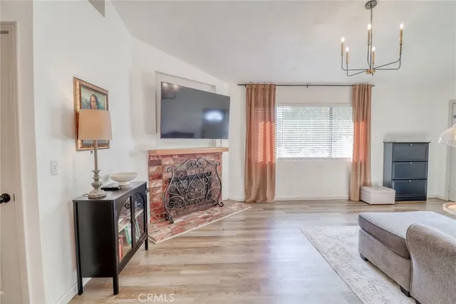 a kitchen with a sink stove and refrigerator