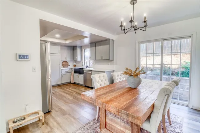 a bedroom with a bed and a table