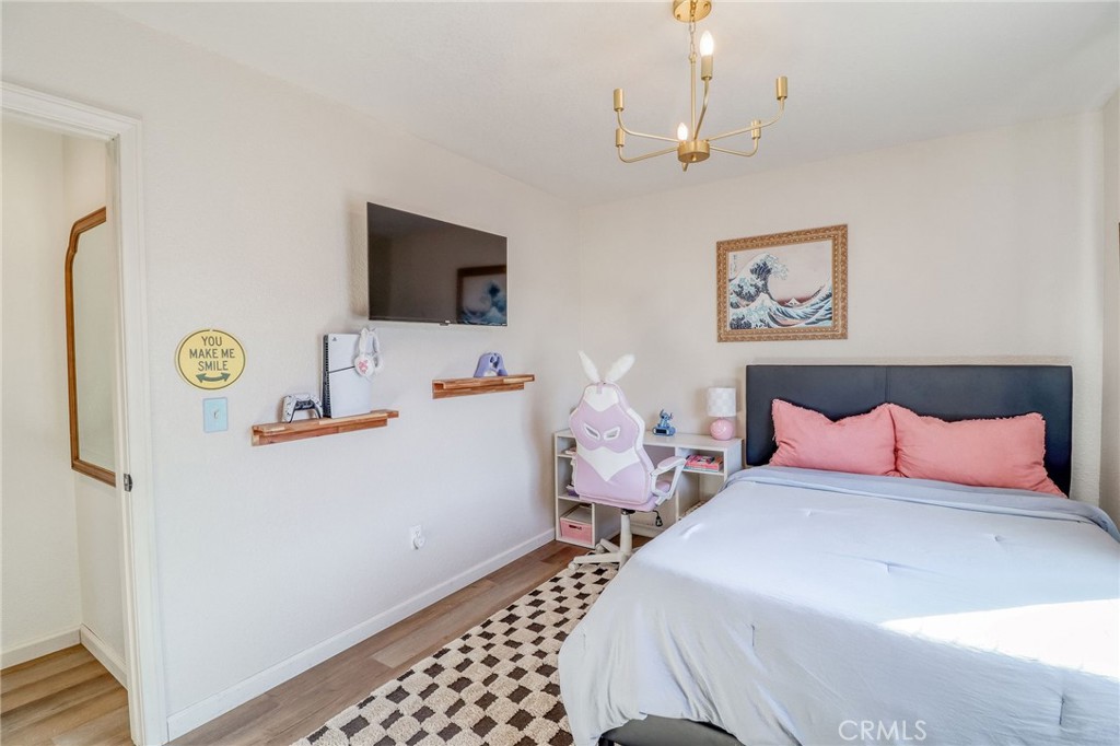 14235 Judy Ann Drive Riverside, CA 92503 - Photo 34 of 68 a bedroom with bed and a window