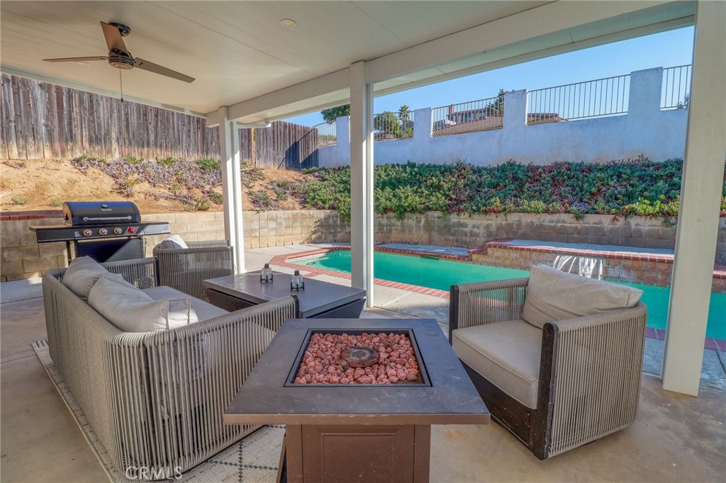 14235 Judy Ann Drive Riverside, CA 92503 - Photo 45 of 68 a living room with furniture and a large window
