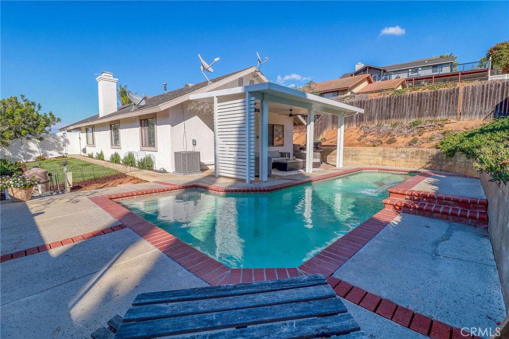 14235 Judy Ann Drive Riverside, CA 92503 - Photo 46 of 68 a front view of a house with garden
