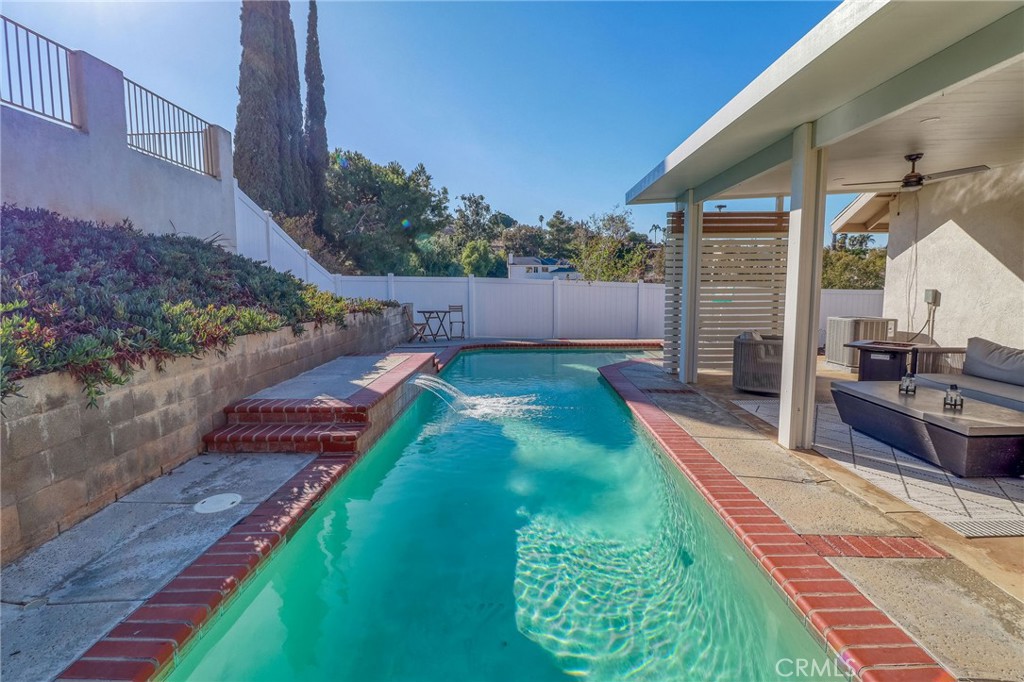14235 Judy Ann Drive Riverside, CA 92503 - Photo 52 of 68 a view of a backyard with potted plants