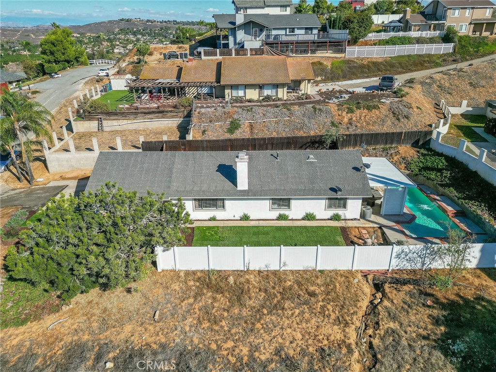 14235 Judy Ann Drive Riverside, CA 92503 - Photo 65 of 68 an aerial view of a house with a lake view