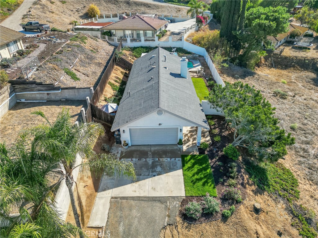 14235 Judy Ann Drive Riverside, CA 92503 - Photo 66 of 68 an aerial view of a house with a yard and a large tree