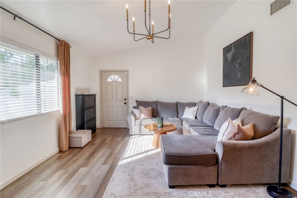 14235 Judy Ann Drive Riverside, CA 92503 - Photo 9 of 68 a living room with furniture and a window