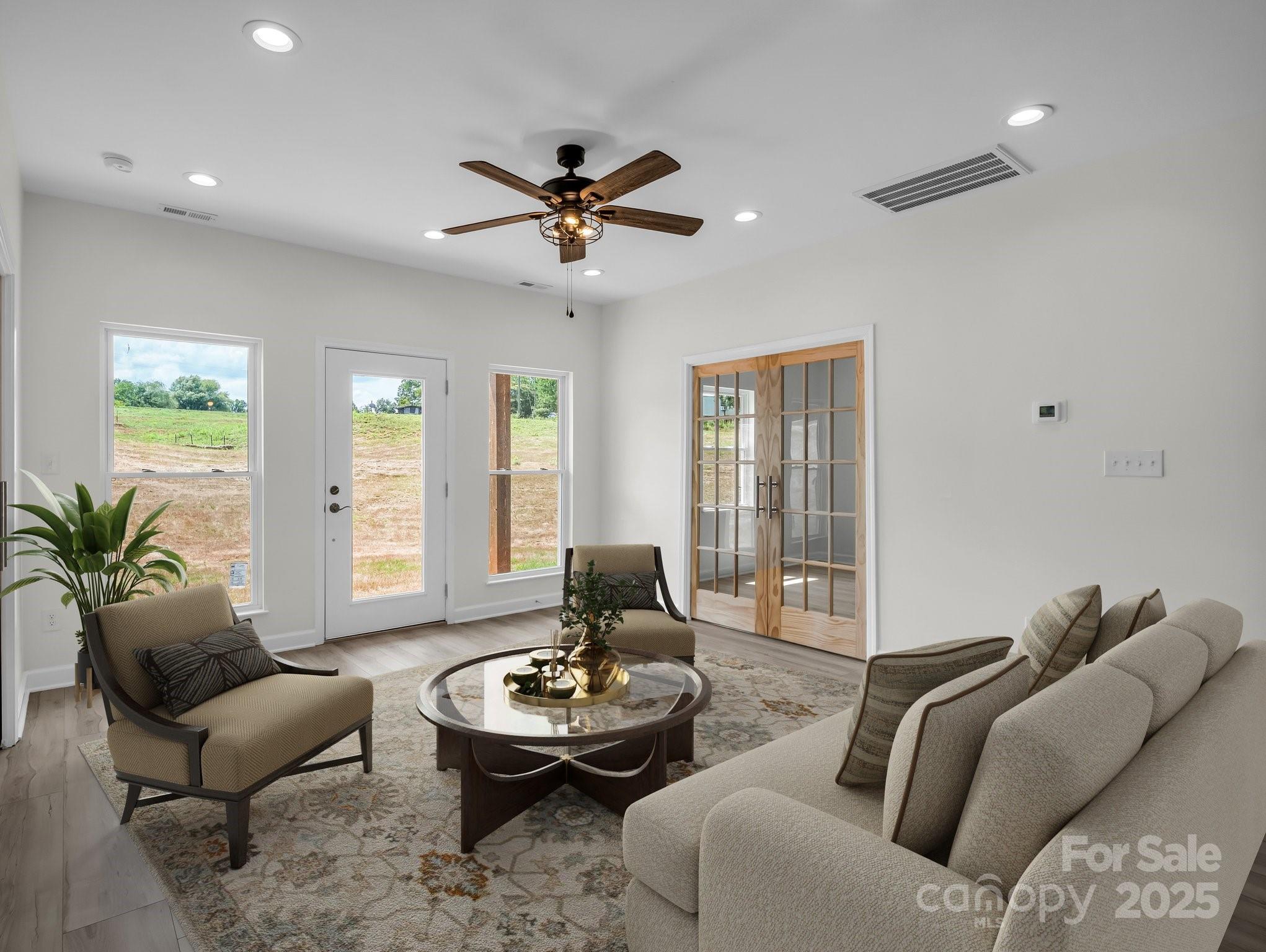 174 Charlie Randall Road Lawndale, NC 28090 - Photo 17 of 41 a living room with furniture and windows