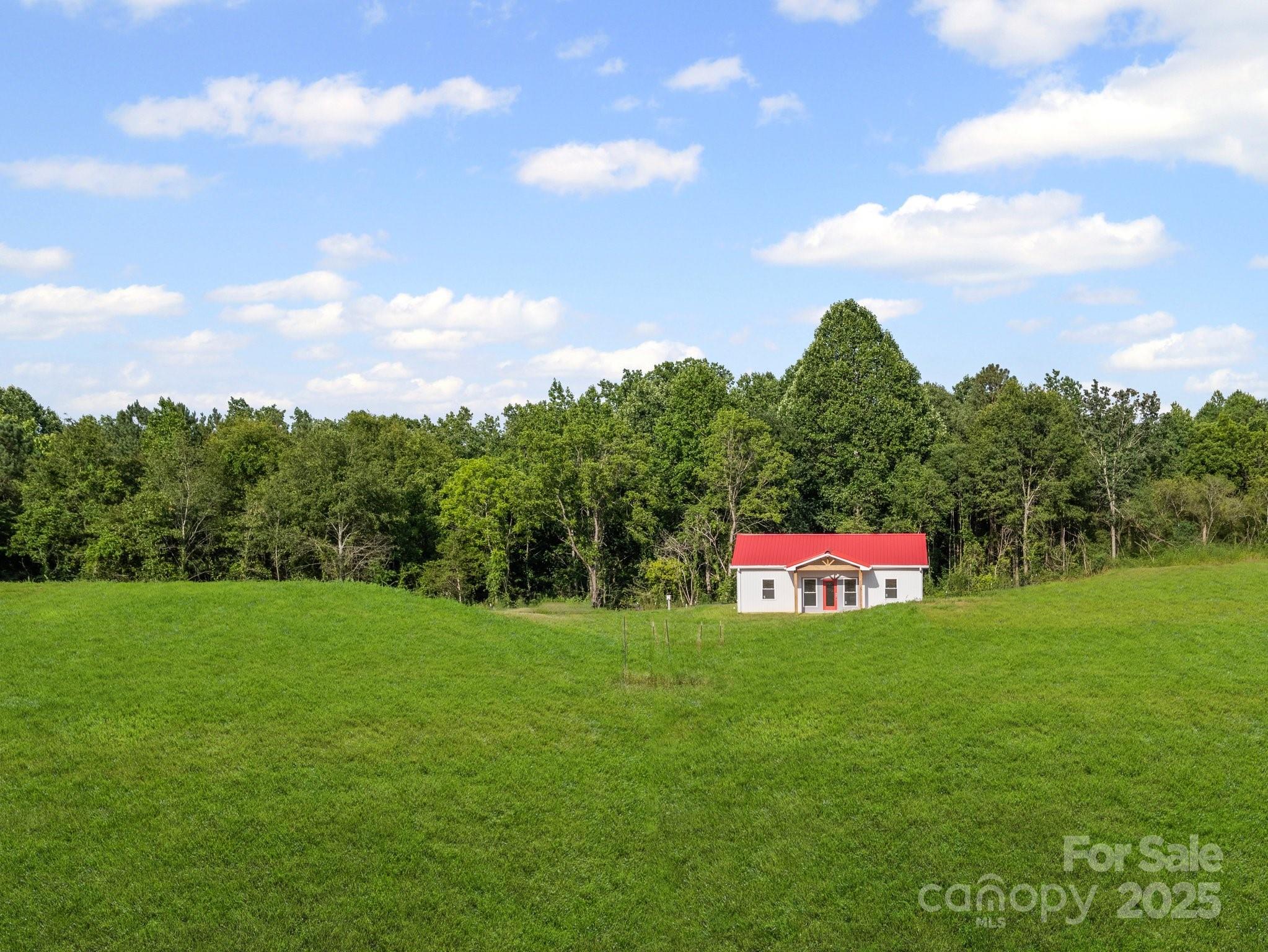 174 Charlie Randall Road Lawndale, NC 28090 - Photo 2 of 41 a view of an outdoor space and a yard