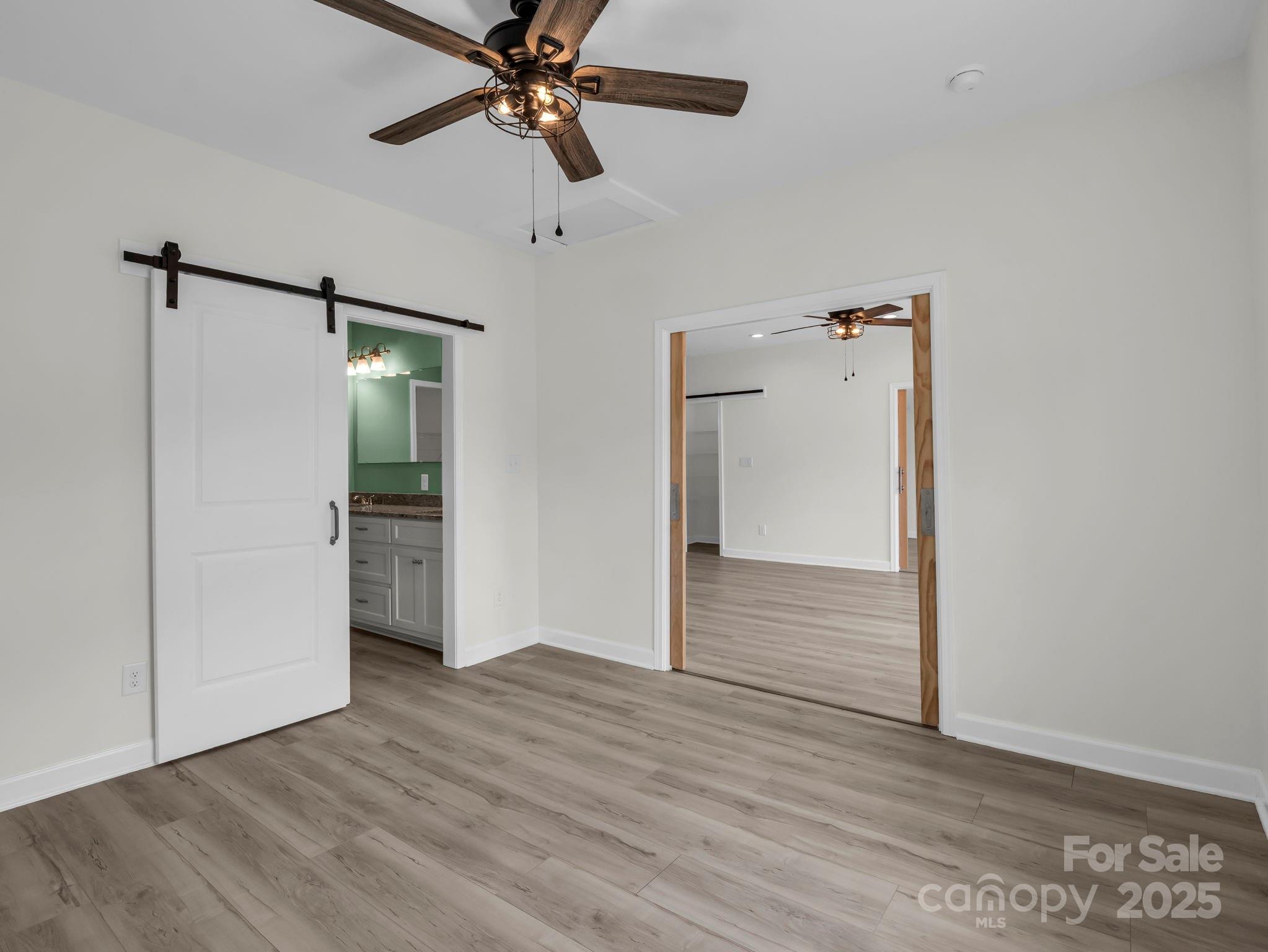 174 Charlie Randall Road Lawndale, NC 28090 - Photo 22 of 41 a view of empty room with wooden floor