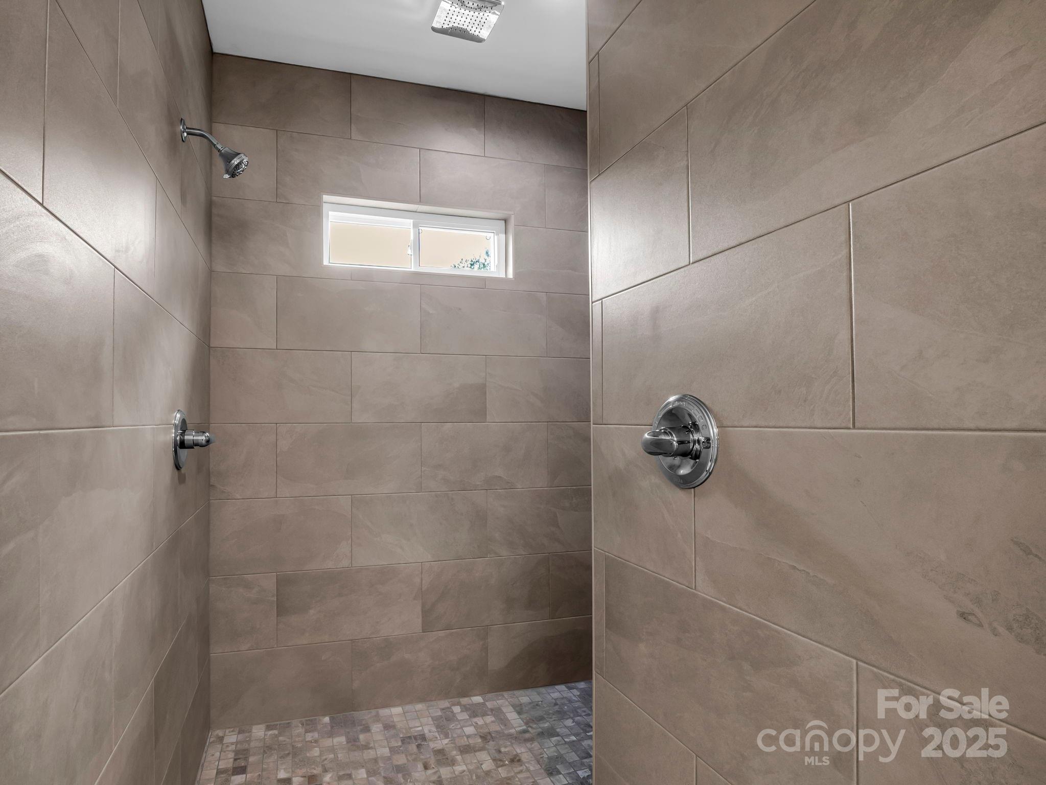174 Charlie Randall Road Lawndale, NC 28090 - Photo 25 of 41 a bathroom with a shower
