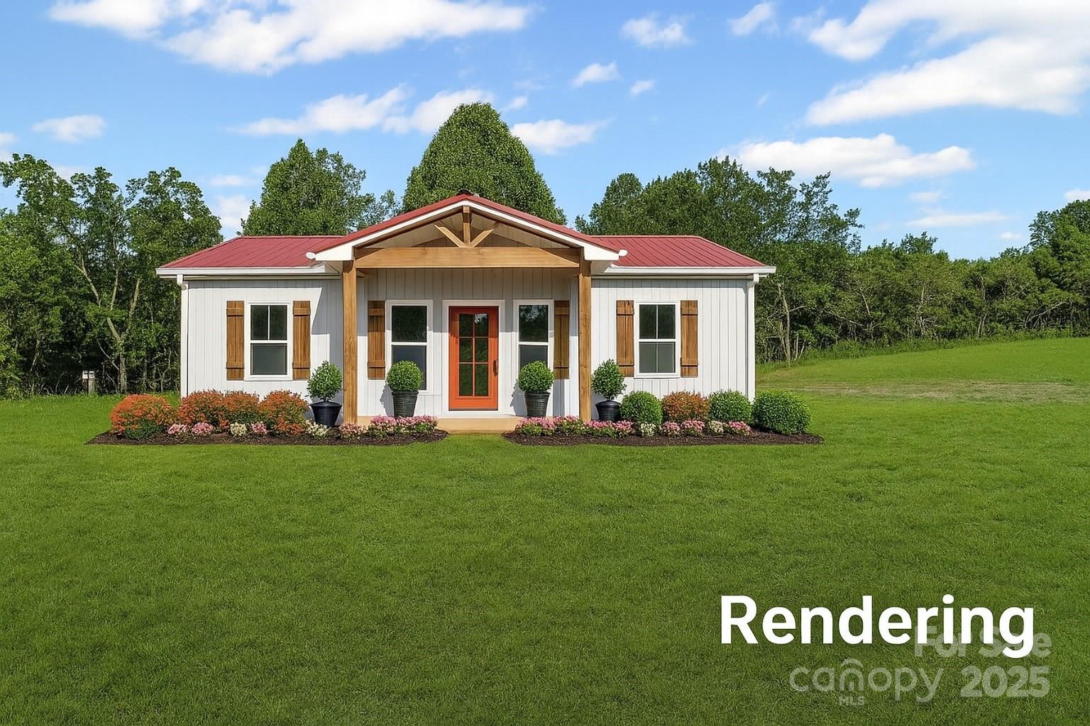 174 Charlie Randall Road Lawndale, NC 28090 - Photo 3 of 41 a front view of a house with a yard