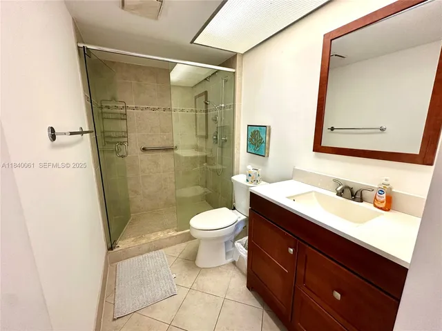 a view of a chairs and table in backyard