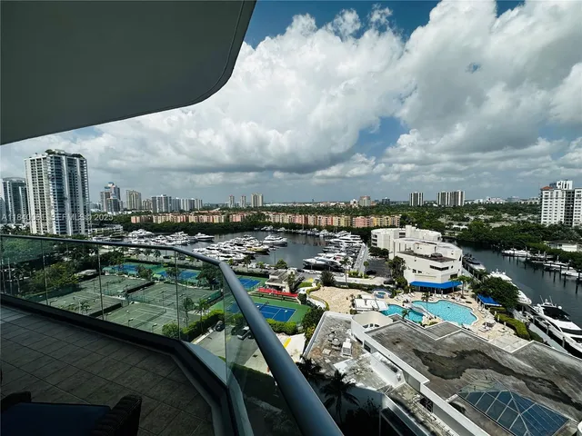 a view of a balcony and chairs