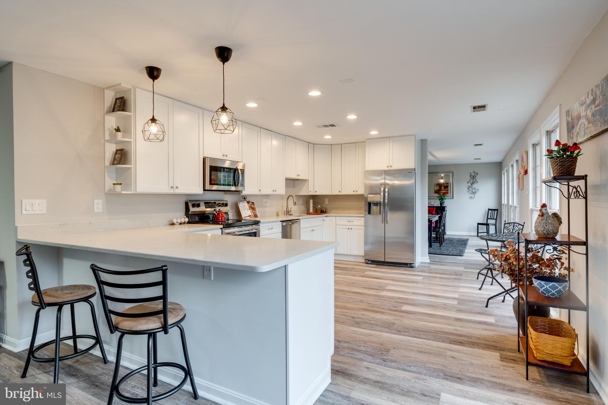 8712 Clydesdale Road Springfield, VA 22151 - Photo 12 of 39 Breakfast/Homework Bar with Pendant Lighting