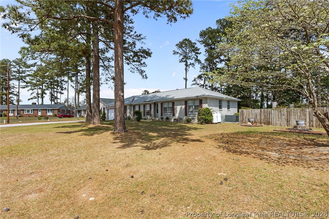 908 Ruton Court Fayetteville, NC 28303 - Photo 29 of 29 a front view of a house with a yard