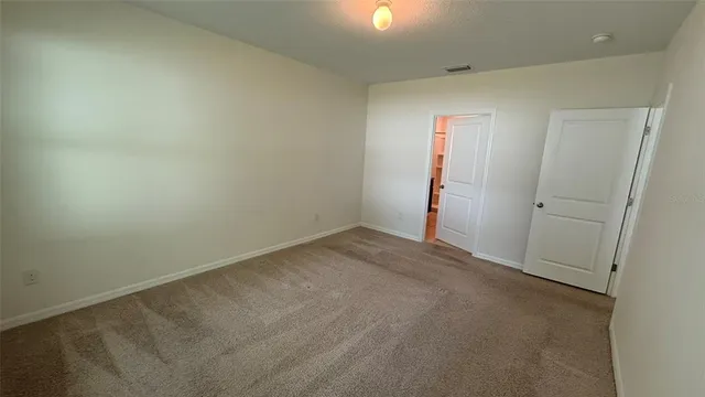 an empty room with an entryway