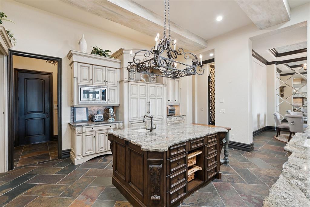 6507 Rosella Court Windermere, FL 34786 - Photo 20 of 92 a spacious bathroom with a granite countertop sink a mirror and a shower