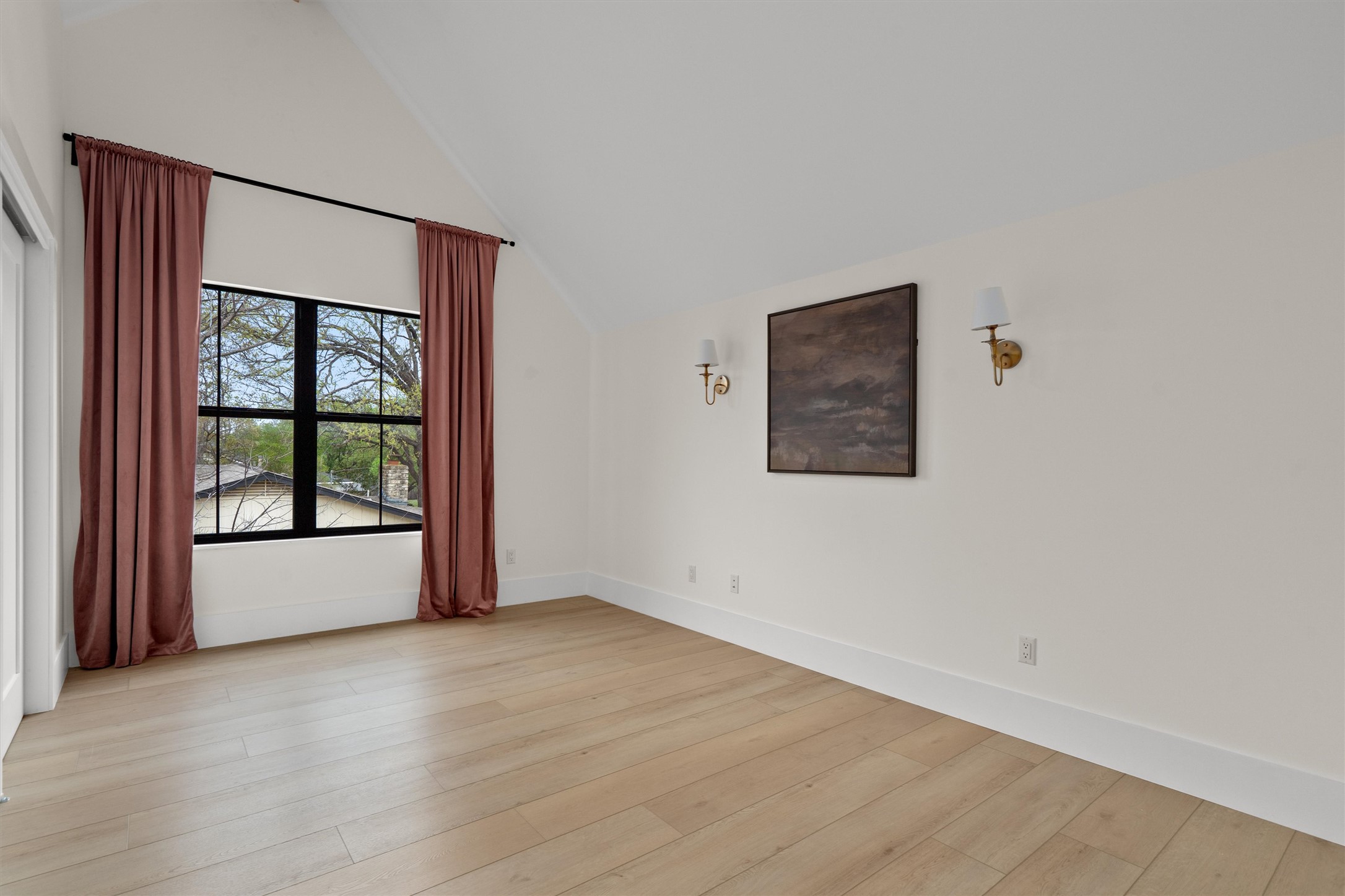 1108 Dunman Drive Georgetown, TX 78628 - Photo 28 of 40 an empty room with wooden floor and windows