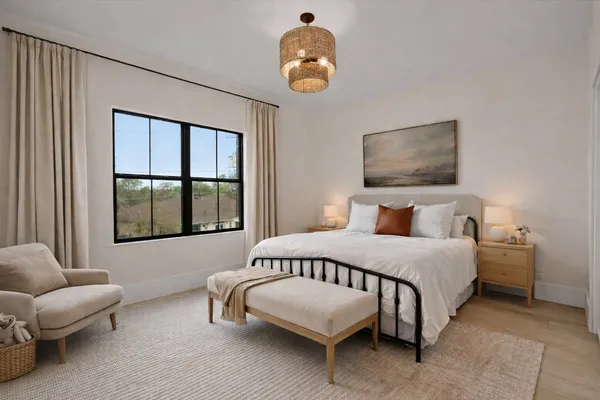 a bedroom with bed and window