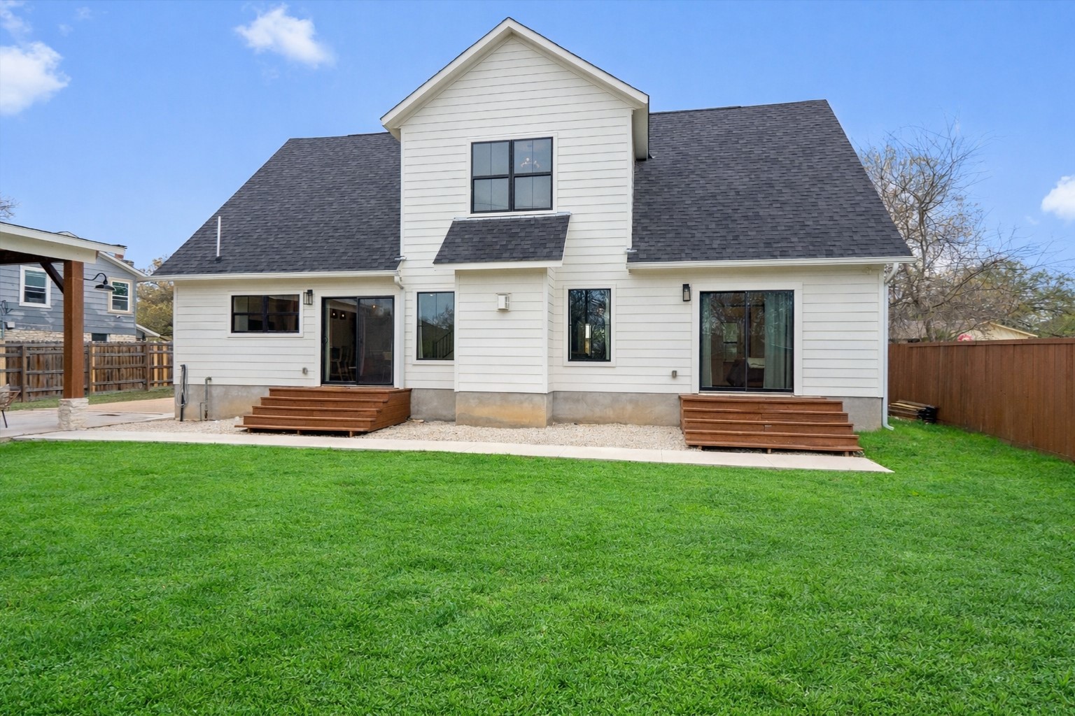 1108 Dunman Drive Georgetown, TX 78628 - Photo 34 of 40 a front view of a house with a yard and garage