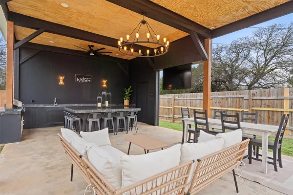 a view of a chairs and tables in the patio