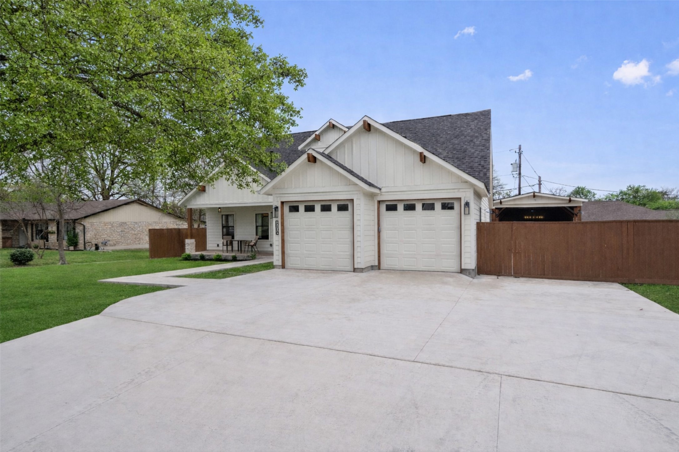 1108 Dunman Drive Georgetown, TX 78628 - Photo 8 of 40 a view of a house with a yard and large tree