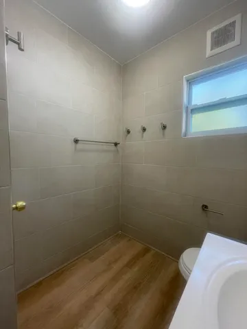 a bathroom with a sink and vanity