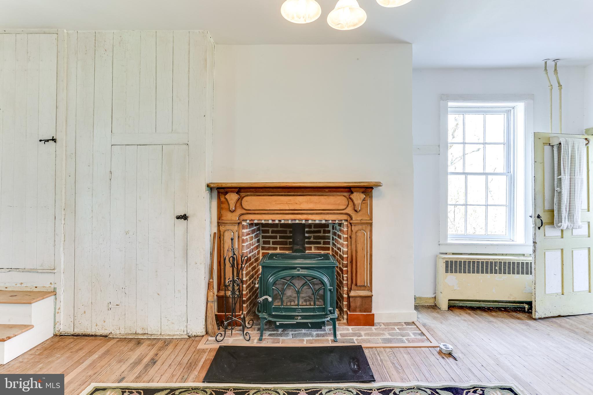 412 Old Bachmans Valley Road Westminster, MD 21157 - Photo 15 of 52 Kitchen area wood stove