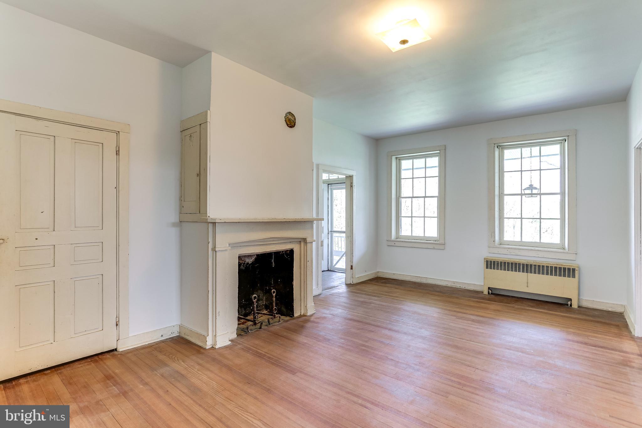 412 Old Bachmans Valley Road Westminster, MD 21157 - Photo 16 of 52 Dining area with fireplace