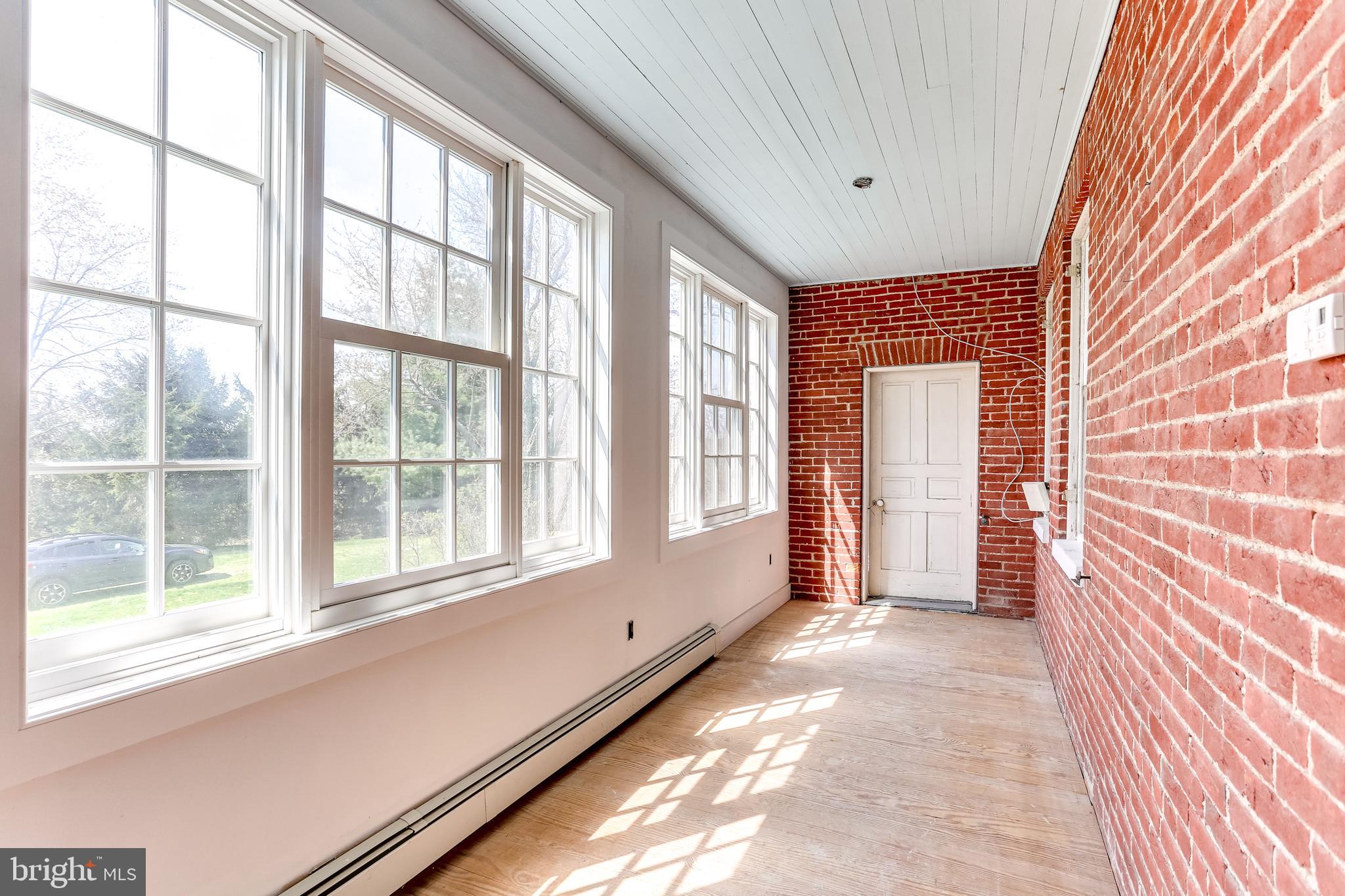 412 Old Bachmans Valley Road Westminster, MD 21157 - Photo 22 of 52 Second floor enclosed porch area