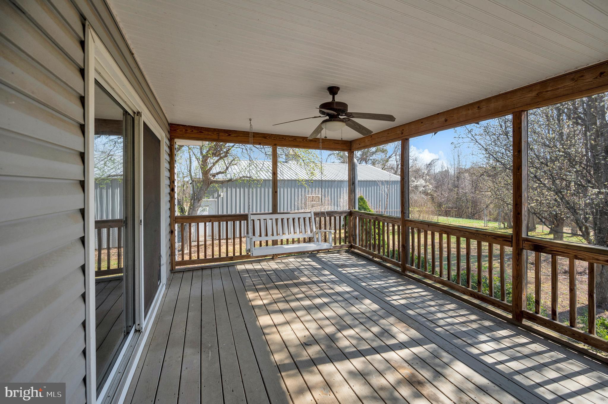 48 Belle Plains Road Fredericksburg, VA 22405 - Photo 11 of 51 a view of a porch with wooden floor and outdoor space