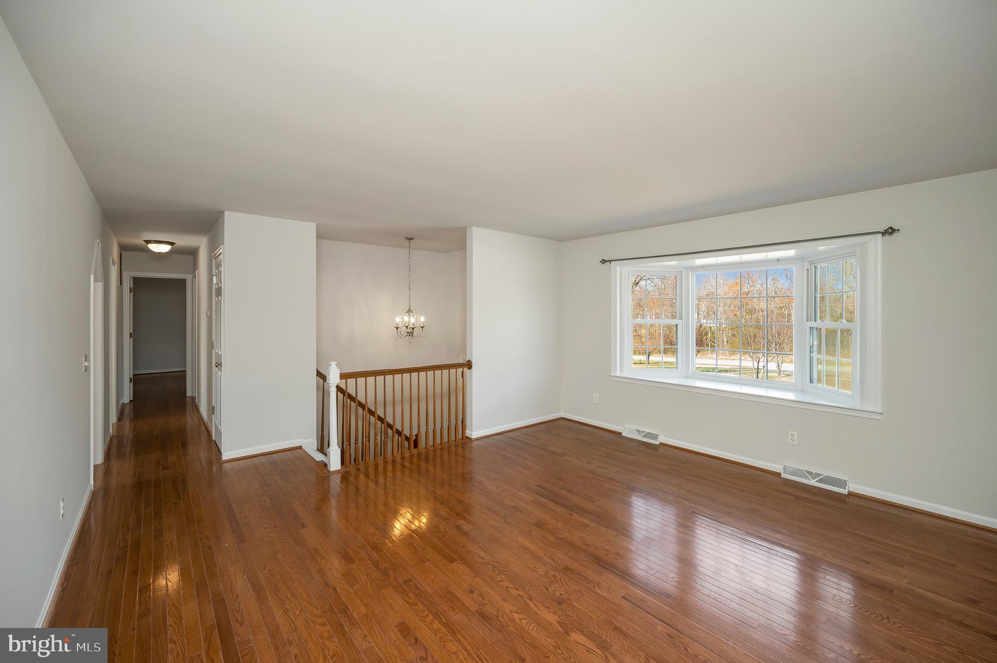 48 Belle Plains Road Fredericksburg, VA 22405 - Photo 16 of 51 wooden floor in an empty room with a window