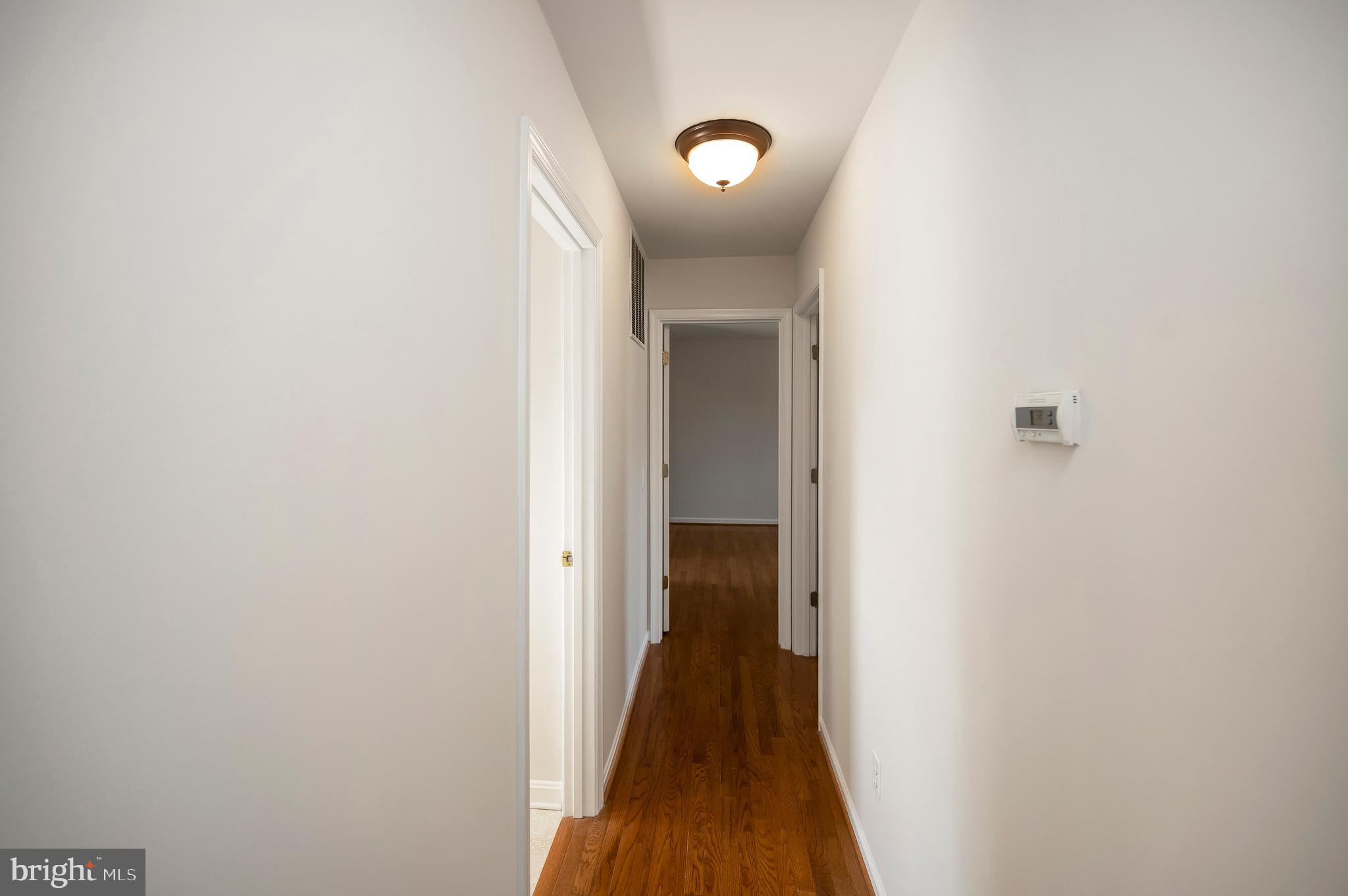 48 Belle Plains Road Fredericksburg, VA 22405 - Photo 17 of 51 a view of a hallway with wooden floor